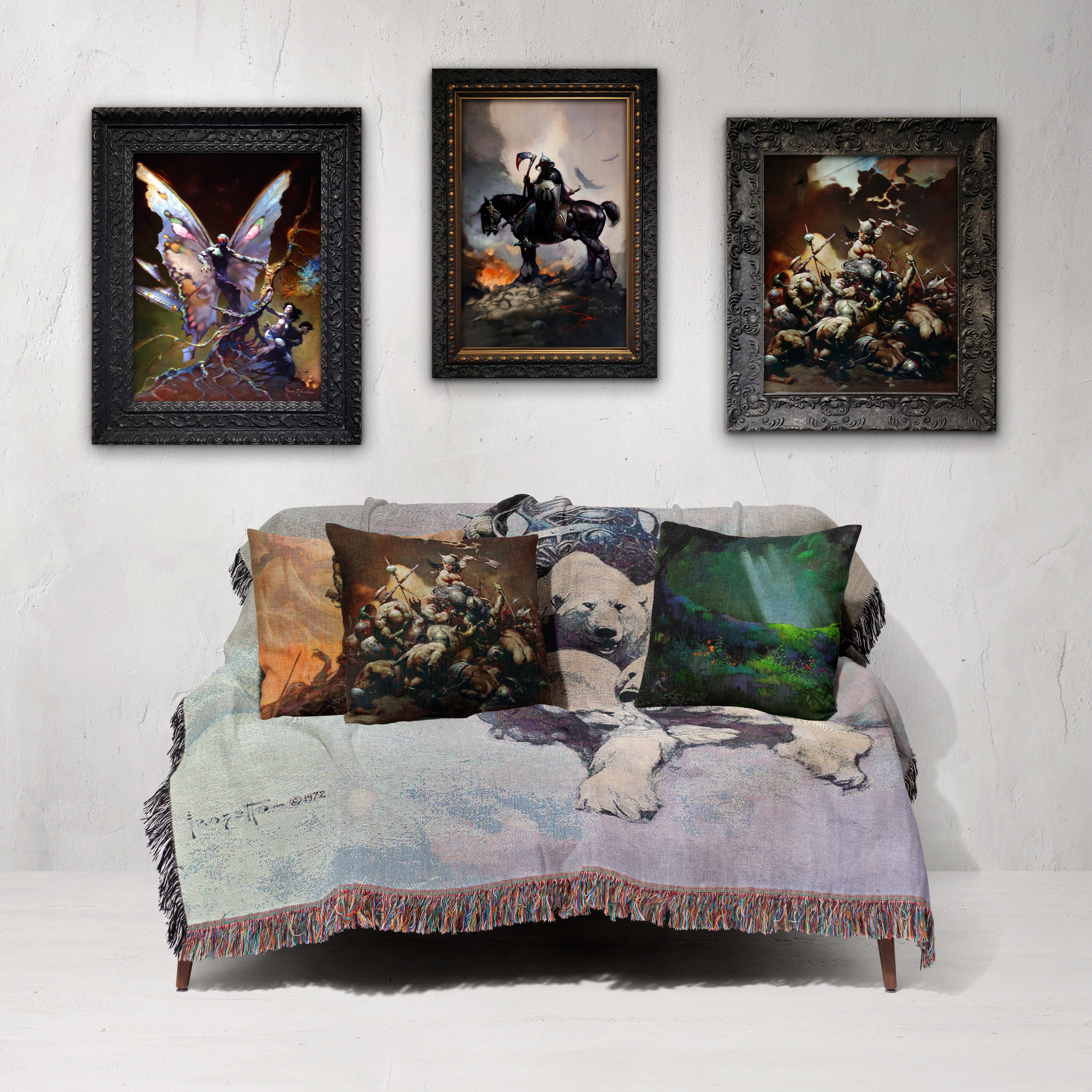 Silver Warrior woven blanket draped over couch, Frazetta pillows are sat atop it