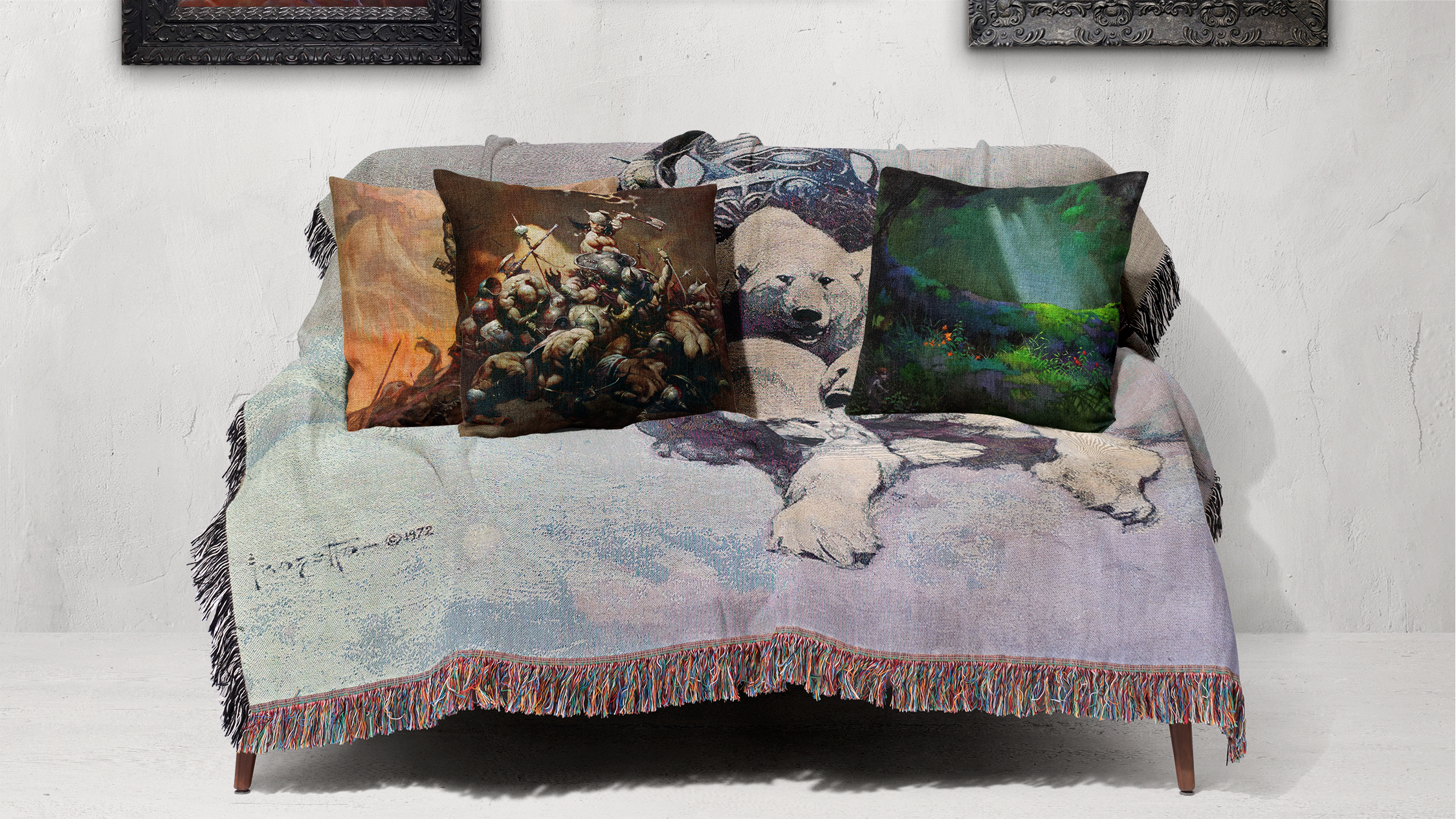 Silver Warrior woven blanket draped over couch, Frazetta pillows are sat atop it