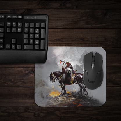 Frazetta’s Death Dealer I mousepad placed on a gaming desk, showcasing its large size and vibrant artwork