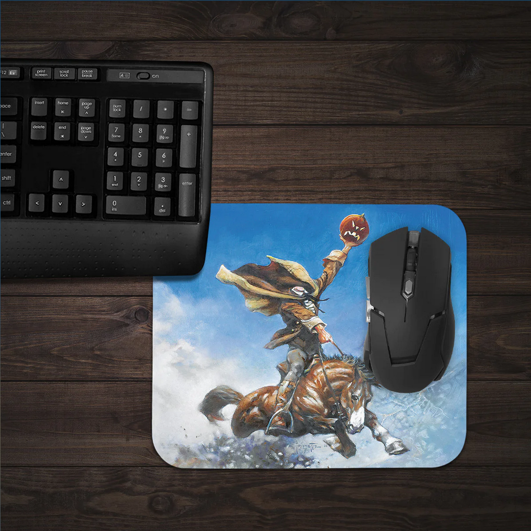 Headless Horseman mousepad on a dark-themed gaming desk