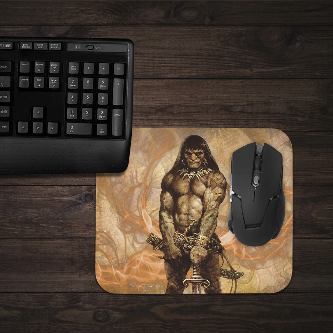 The Barbarian mousepad on a desk with an epic fantasy theme